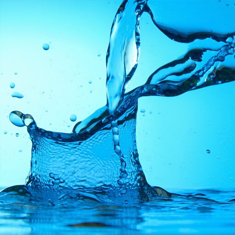 Splashing water with blue background.